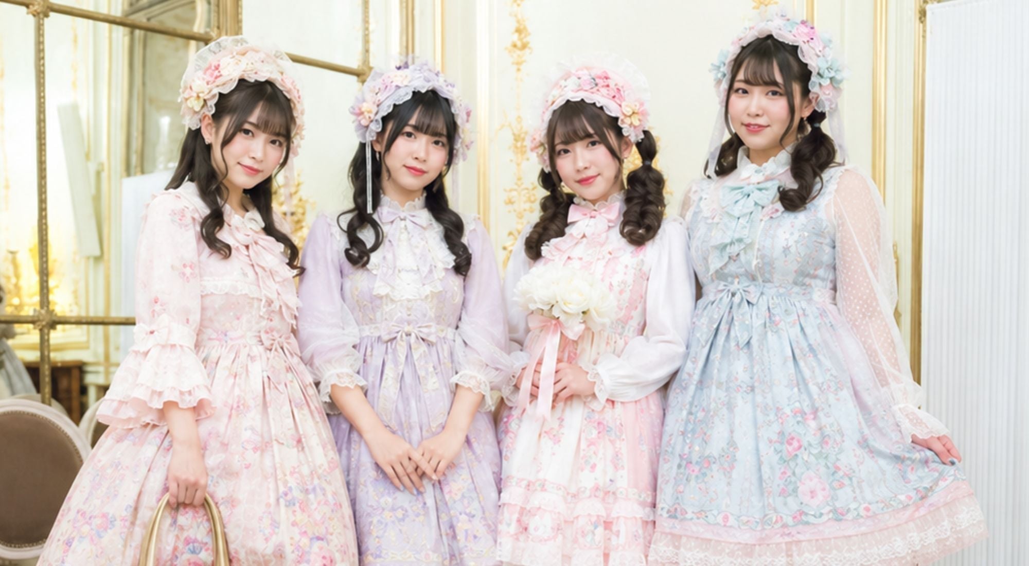 Group of japanese women's in lolita outfits